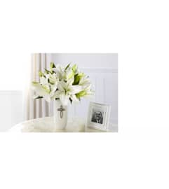Faithful Sympathy. An arrangement by Novak's Flower Shoppe.