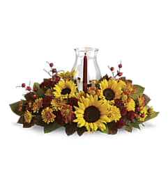 Autumn Sunflower Centerpiece. An arrangement by Love Story Florist.