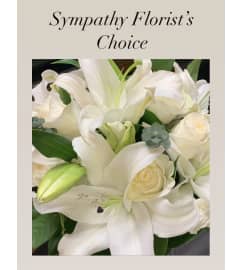 Sympathy Florist's Choice. An arrangement by Violeta's Flower Shop. Sympathy Florist's Choice. An arrangement by Violeta's Flower Shop.