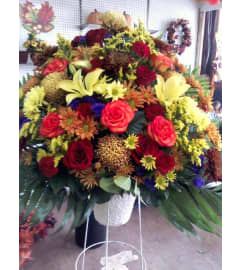 standing basket/autumn. An arrangement by Howard Beach Florist.