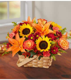 THANKSGIVING BASQUET. An arrangement by Heavenly Flowers.