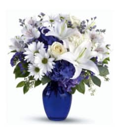 Blue Charm. An arrangement by Awesome Blossom.