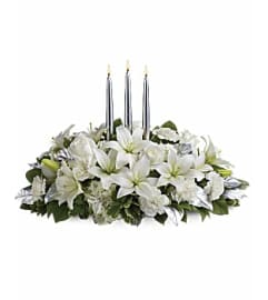 Metallic Winter Centerpiece. An arrangement by Aventura Glamour Flowers. Metallic Winter Centerpiece. An arrangement by Aventura Glamour Flowers.
