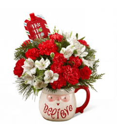 The FTD Believe Mug Bouquet. An arrangement by Roma James Gifts.