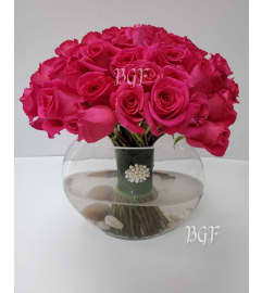 Pink Glamour Half Moon Roses. An arrangement by Brickell Exclusive Blooms.