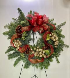 Christmas Wreath 2020. An arrangement by Shalimar Flower Shop. Christmas Wreath 2020. An arrangement by Shalimar Flower Shop.