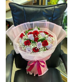 Trendy Rose handtied Bouquet. An arrangement by Sunrise Floral and Gifts.