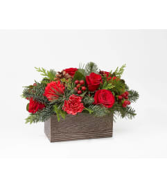 Christmas Boxwood Centerpiece. An arrangement by Love Story Florist.