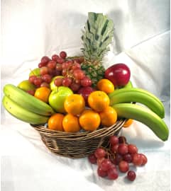 Locally made Fruit Baskets. An arrangement by Flowers By Gerry.