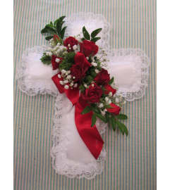 Satin Cross Pillow. An arrangement by Always in Bloom Flower Shop.