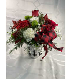 Moose and Buffalo Plaid. An arrangement by Flowers By Gerry.