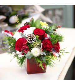 Christmas Hugs. An arrangement by Napanee Blooms.