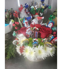 Candy and flowers. An arrangement by Jane's Floral Dreams.