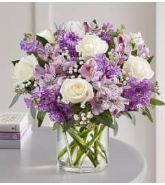 Purple and White Garden Mix. An arrangement by Crown Heights Florist and Fruit Baskets.