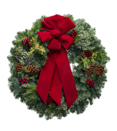 Fresh Tradiitional Wreath with Red Berries. An arrangement by The Greenhouse Florist.