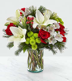THE CHRISTMAS SPIRIT. An arrangement by Floral Insight.