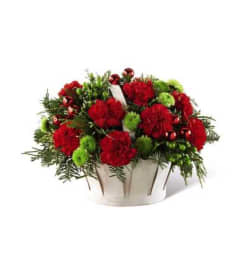 The Winter Wishes Basket FTD. An arrangement by Pine Knoll Florist.