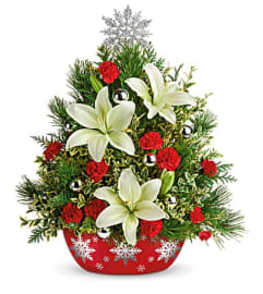 Teleflora's Shimmering Snowflakes Tree Flower Arrangement. An arrangement by Tim's Florist and Garden. Teleflora's Shimmering Snowflakes Tree Flower Arrangement. An arrangement by Tim's Florist and Garden.
