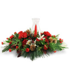 Warm glowing centerpiece. An arrangement by Galbraith Florist.