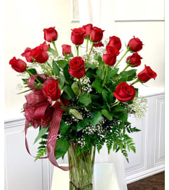 Beautiful Dozen Roses. An arrangement by Violeta's Flower Shop.