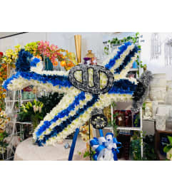 In Loving Memory Airplane Tribute. An arrangement by Sonia's Florist.