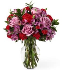 PURPLE MIX. An arrangement by Spring Branch Florist.