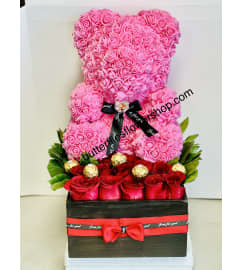 Dozen Roses and Bear. An arrangement by Butterflies Flower Shop.