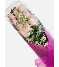 Light Pink Boxed Roses. An arrangement by Hillcrest Florist.