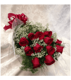 Dozen Red Roses Wrapped. An arrangement by Wasaga Flowers.