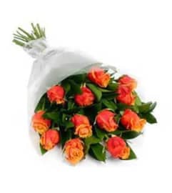 Dozen Orange Roses Wrapped. An arrangement by Wasaga Flowers.
