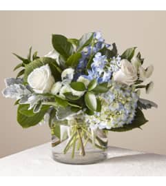 Clear Skies Bqt. An arrangement by Petals and Co..