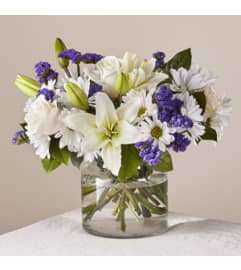 Beyond Blue Bqt Clear. An arrangement by Petals and Co..