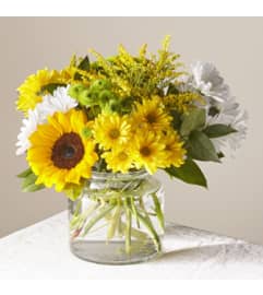 Hello Sunshine bqt. An arrangement by Petals and Co..