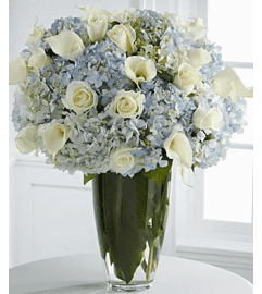 Classic Skies. An arrangement by Aventura Glamour Flowers. Classic Skies. An arrangement by Aventura Glamour Flowers.