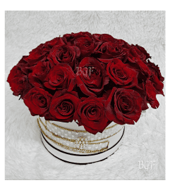 Channel Roses in a Couture Box. An arrangement by Brickell Exclusive Blooms.