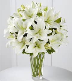 White Oriental Sophistication Arrangement. An arrangement by Brickell Exclusive Blooms.