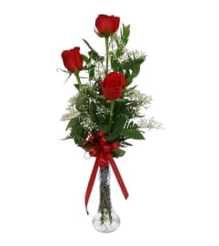 3 Red Roses Arranged in a Bud Vase. An arrangement by Sueppel's Flowers.