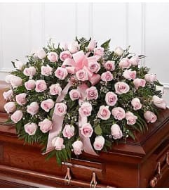 Pink Remembrance Casket Spray. An arrangement by Brickell Ave Florist. Pink Remembrance Casket Spray. An arrangement by Brickell Ave Florist.