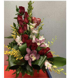 Red Roses Wave. An arrangement by Rosa Flowers and Gifts.