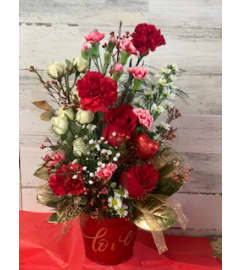 Sweet bucket of Love. An arrangement by Yesterday's Florist and Gifts.