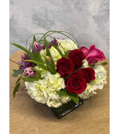 Springtime Romance. An arrangement by Masters and Company Florist.