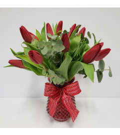12 Red Tulips in a vase. An arrangement by Prestige Floral.
