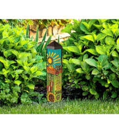 PEACEFUL JOURNEY GARDEN ART POLE. An arrangement by Novak's Flower Shoppe.