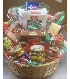 ANTIPASTO BASKET. An arrangement by Angela's Floral Gallery.