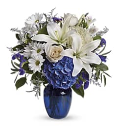 Beautiful in Blue Vase Bouquet. An arrangement by Love Story Florist.
