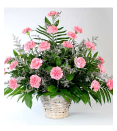 Traditional Pink Sympathy Basket. An arrangement by Shalimar Flower Shop.