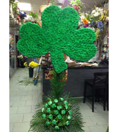 Standing Spray Shamrock. An arrangement by Elegant Florist.