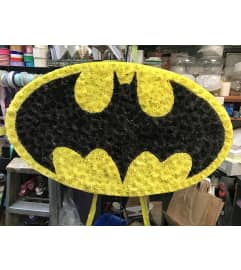 Batman sign. An arrangement by Elegant Florist.
