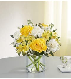Yellow and white delight arrangement. An arrangement by Elegant Florist.