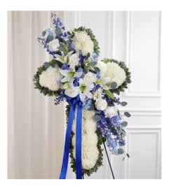 Peace and Prayers™ Blue and White Standing Cross. An arrangement by Elegant Florist.